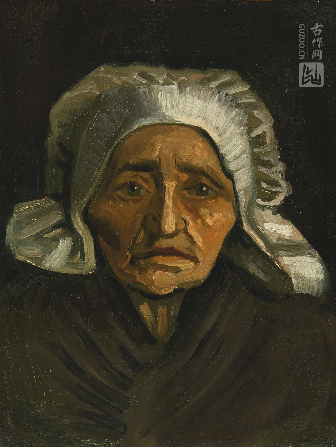 梵高作品《一个戴着白帽子的老年农妇的头像》